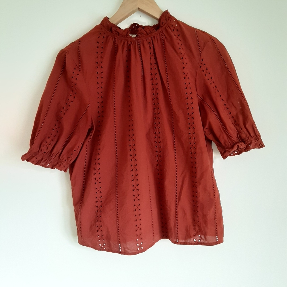 Red embroidered blouse